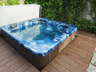 A moving company is equipped to handle your personal property, such as a hot tub, with care.