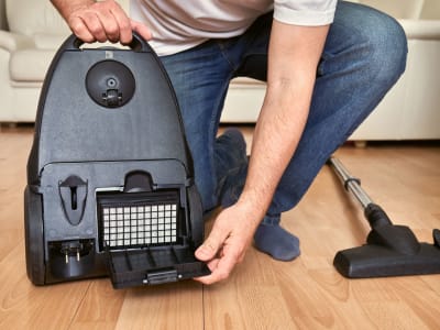 Use a HEPA filter vacuum to remove dust from your carpets and floors before your packers and movers arrive.