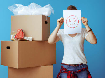 Turn that frown upside down with these stress-relieving moving tips.