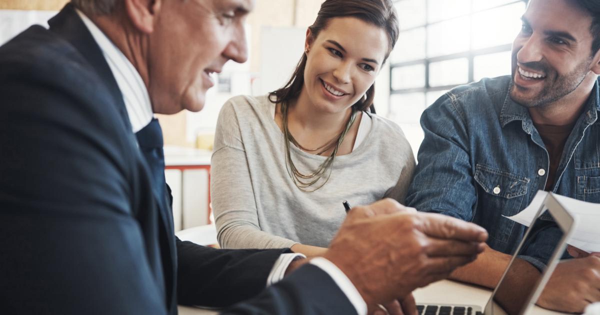 Financial advisor discussing biblically informed investment funds and multi-asset portfolio strategies with clients