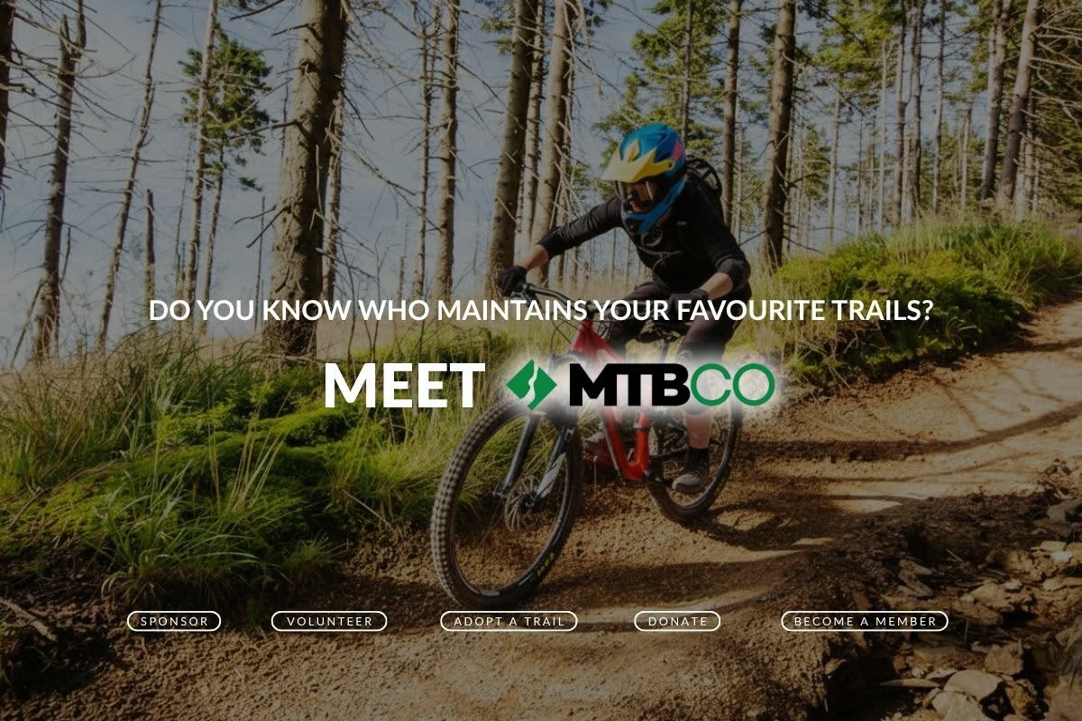  A mountain biker rides a flowing singletrack trail through a forest. Text overlay reads 