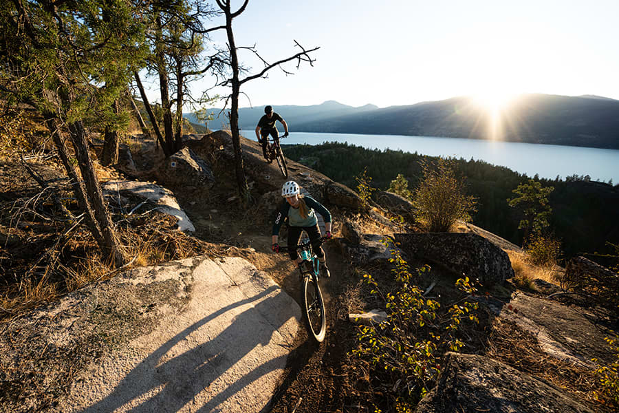 Bikers on a mountain trail riding bikes provided by Fresh Air