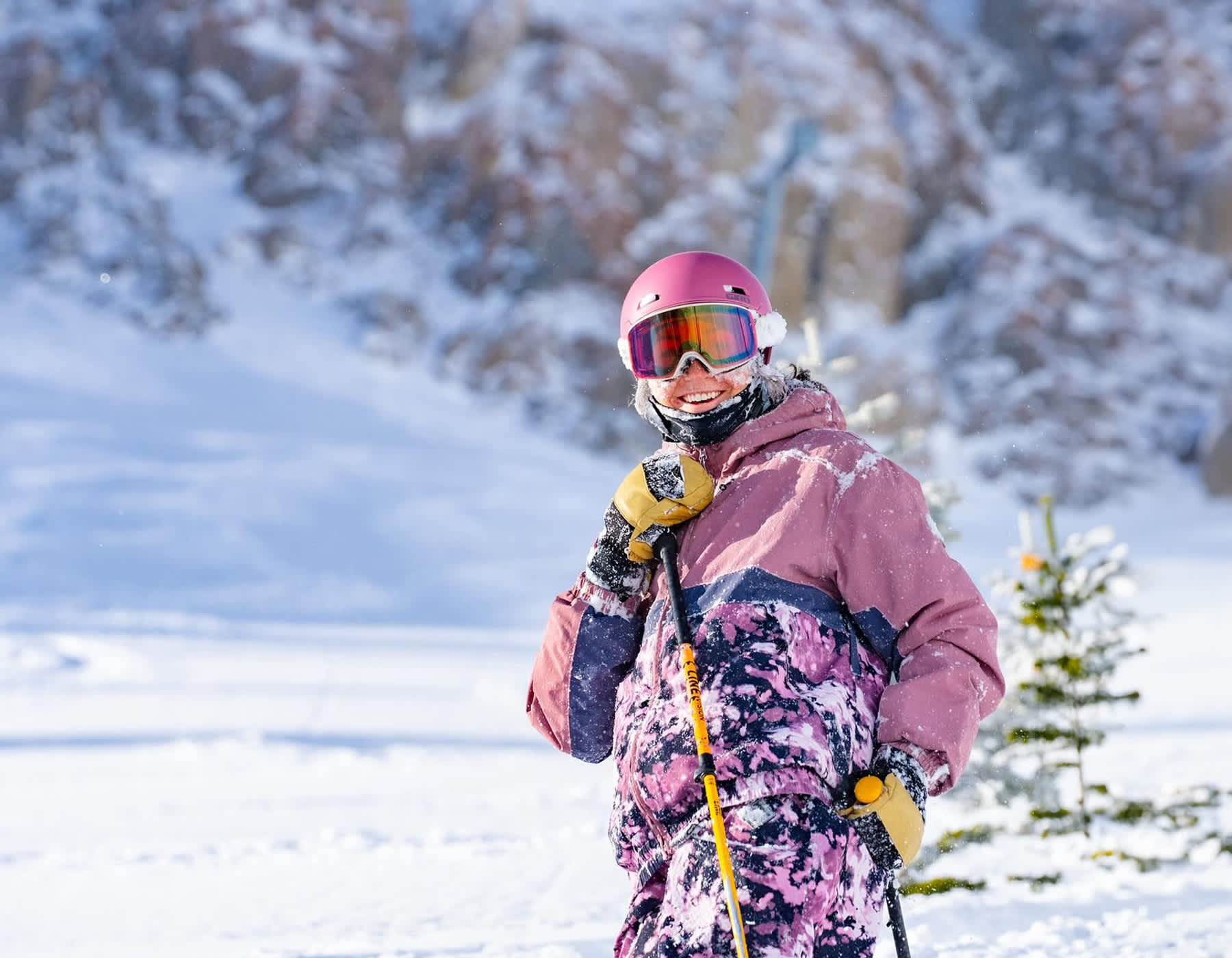 Skier pausing at the top of a mountain, wearing BlackStrap baselayers and wearing a balaclava. BlackStrap – shop at Fresh Air Kelowna