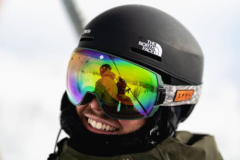 Jordan in his happy place getting ready to ride his snowboard.