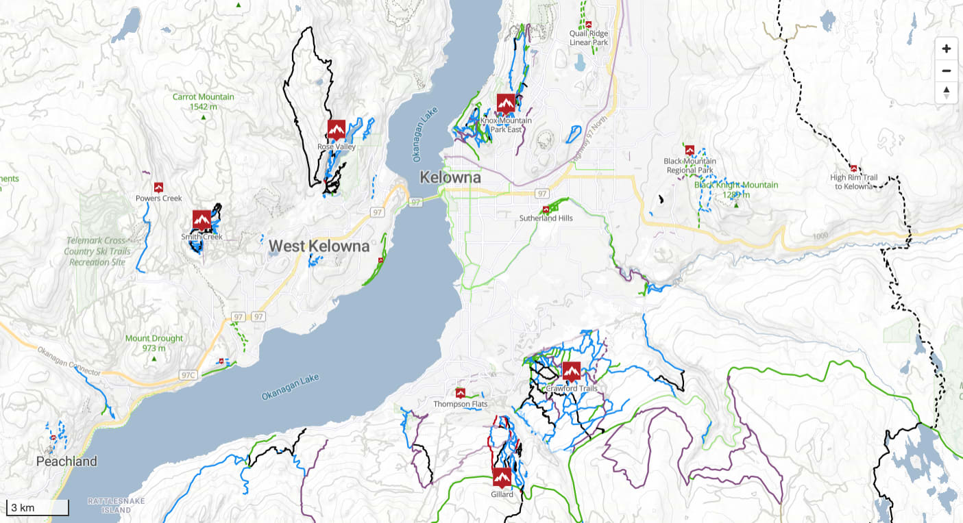 A Trailforks map showing the trail networks around Kelowna and West Kelowna, BC. Named locations include Knox Mountain Park East, Crawford Trails, Gillard, Smith Creek, and Rose Valley, with Okanagan Lake running through the centre of the map.