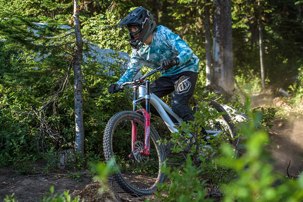 Cole downhill mountain bike races close to home on the Squirts trail at the Big White Toonie Race.