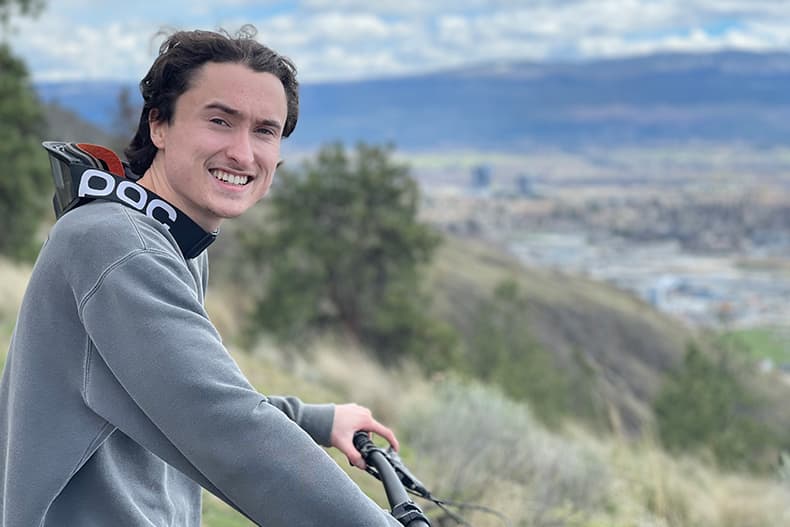 Connor explores the Kelowna mountain biking trails in the summer and you can find him on his snowboard come winter. 