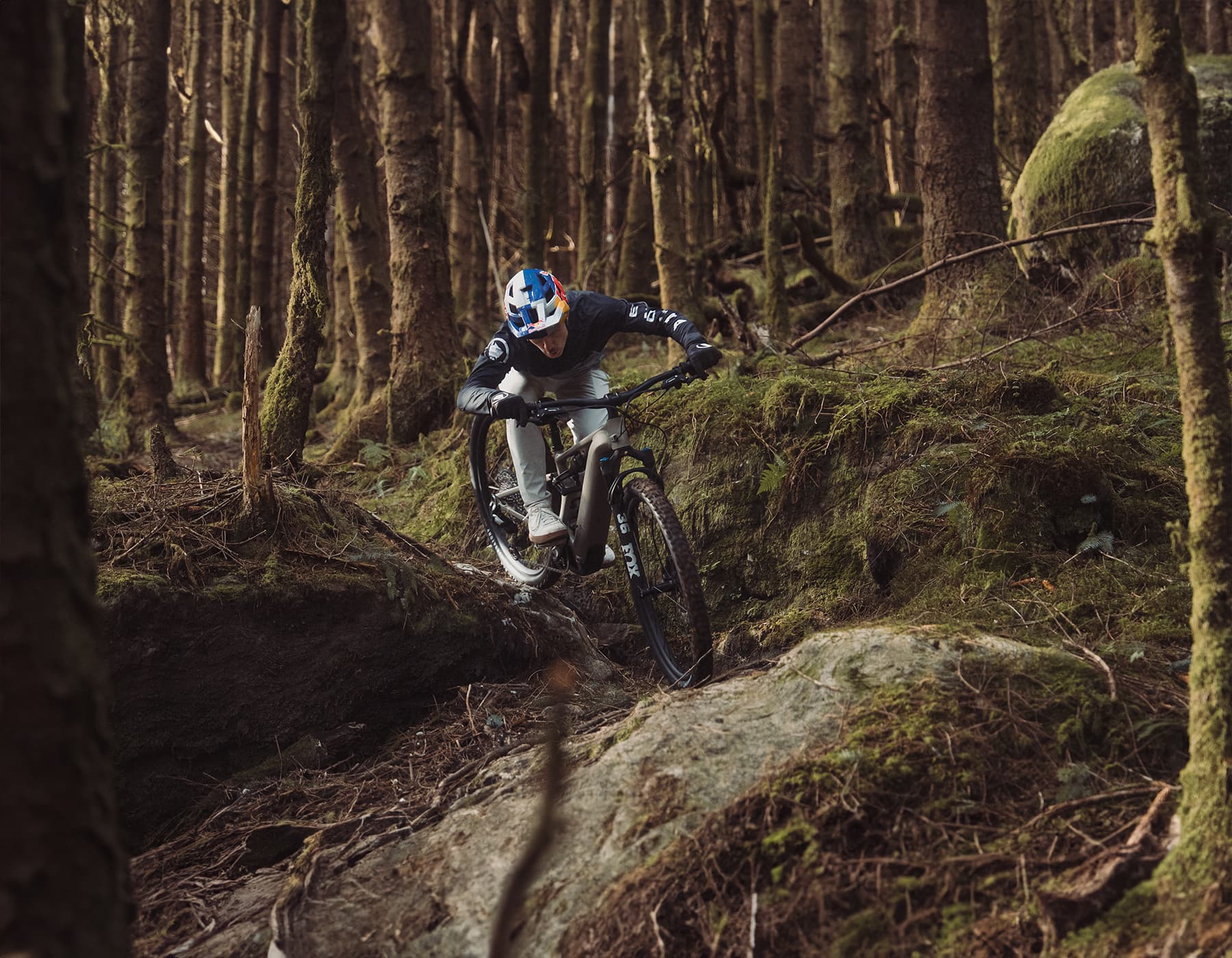 Specialized Levo R Comp Alloy electric mountain bike rider descending technical trail with full suspension