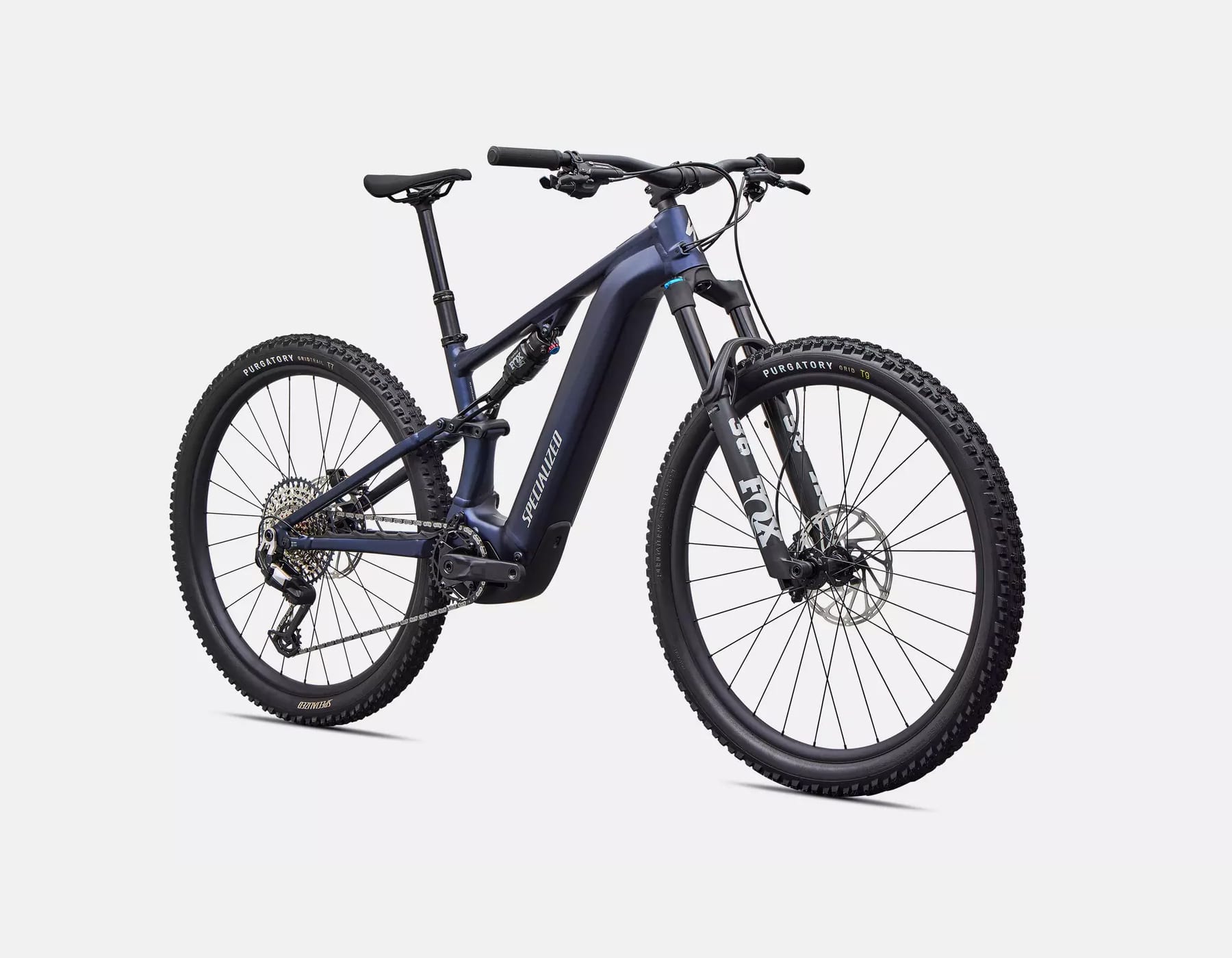 Specialized Levo R Comp Alloy e-MTB rider climbing uphill trail with Turbo 3.1 motor and 840Wh battery