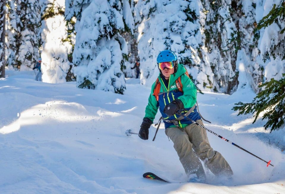 Skiers make the most of the diverse terrain at Keefer Lake Lodge, with a mix of tree runs, alpine bowls, and steep slopes.