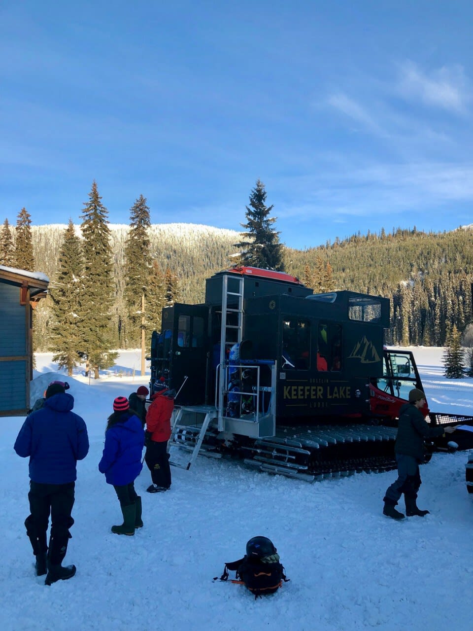 Skiers enjoy the comfort of Keefer's well-equipped snowcats as they travel through the stunning landscape.