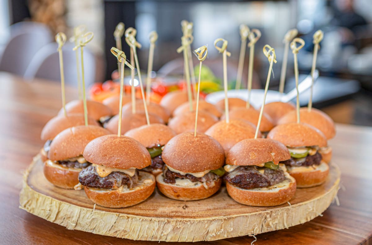 angus-beef-sliders,-caramelized-onions,-smoked-gouda-and-dill-pickles