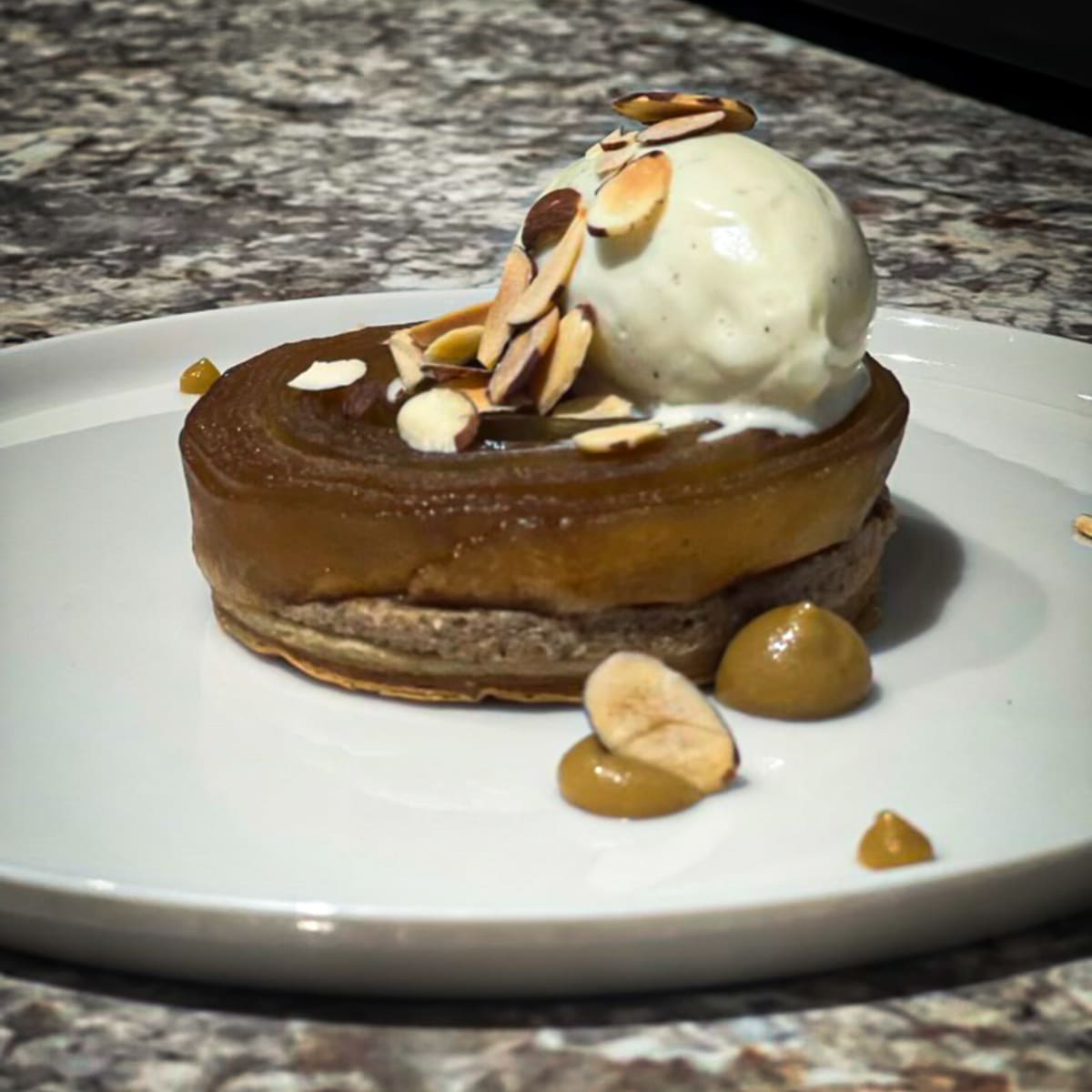 apple-tatin-swirl-with-almond-butter,-and-puff-pastry,-housemade-vanilla-ice-cream