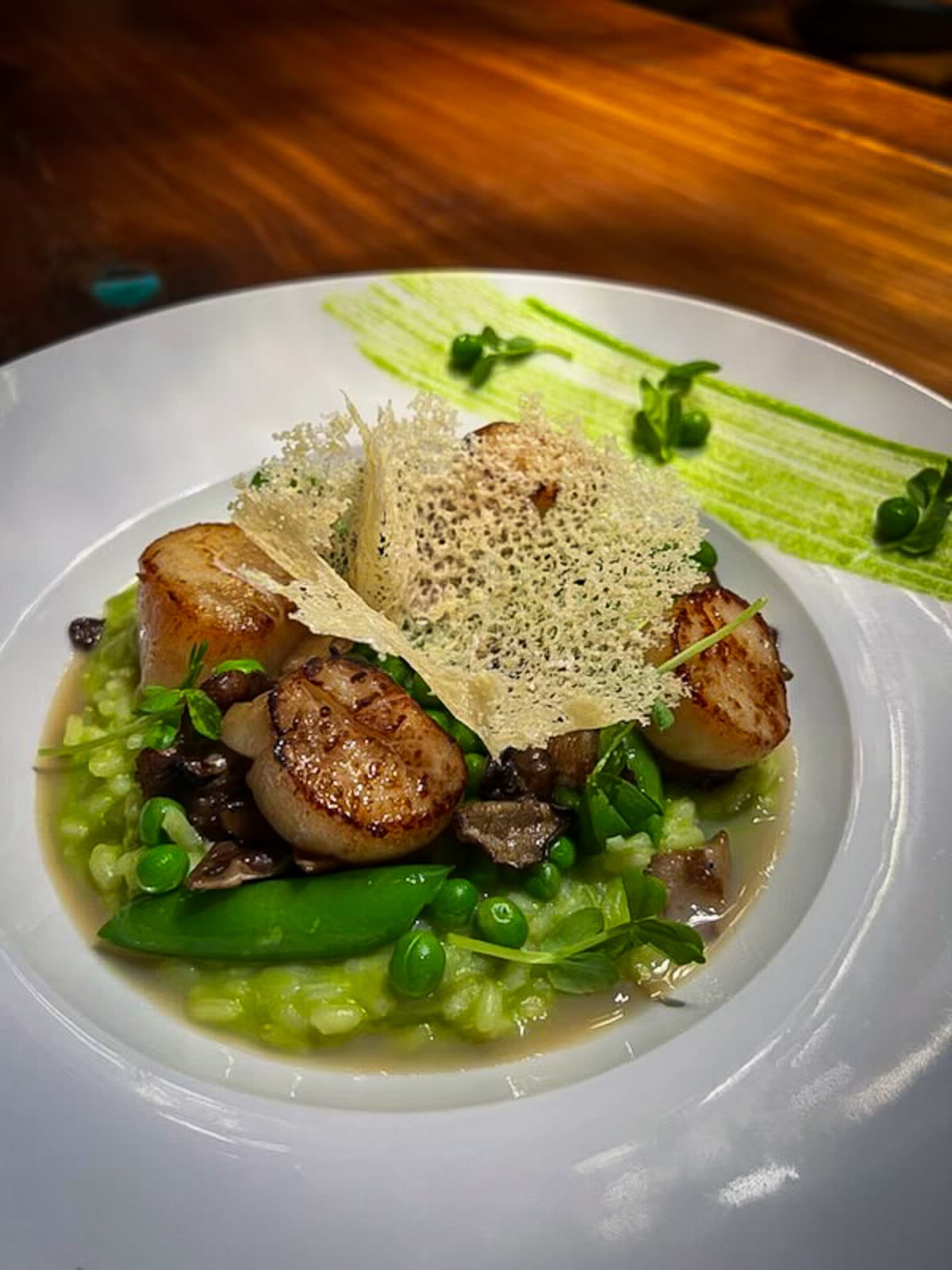 seared-scallops,-served-on-a-wild-mushrooms-and-peas-risotto-bed,-parmesan-tile