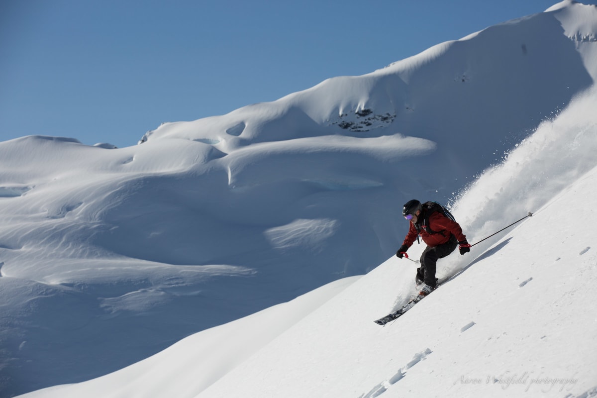 Skier_Turning_on_Slope_Snow_Spray_3