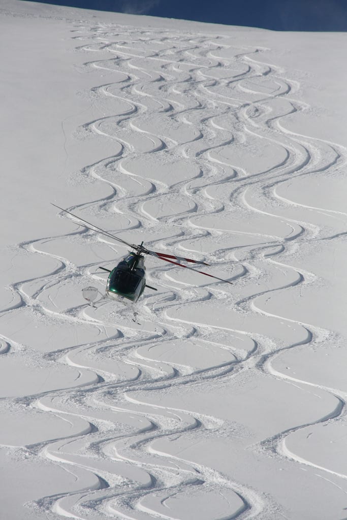 Heli-skiing in deep powder snow in British Columbia, Canada