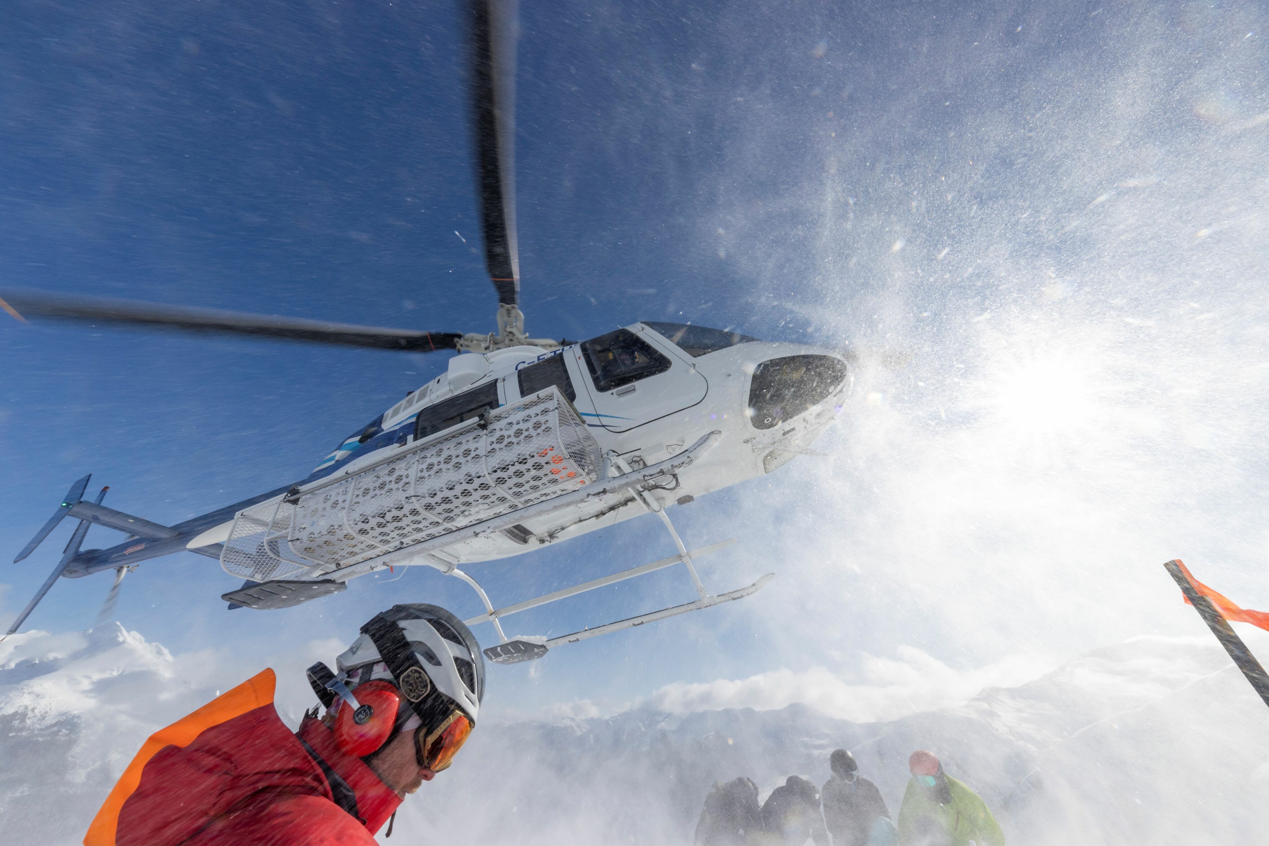 Heliskiing landing and pickup