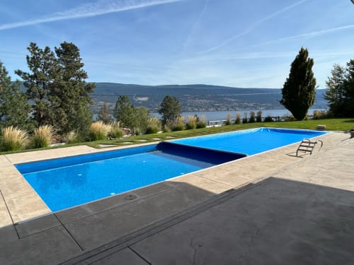 light blue pool cover opening in the Okanagan