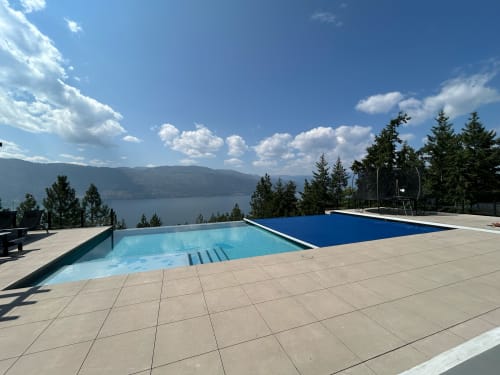 navy blue infinity pool cover open in the Okanagan