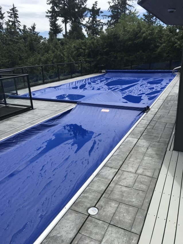 Kelowna automatic pool cover installation with pool cover fence
