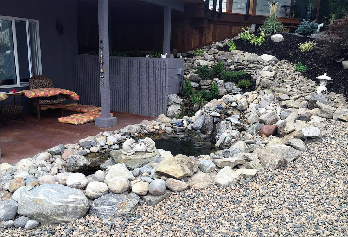 A pond is one of the exterior water features that can accentuate Kelowna pools.