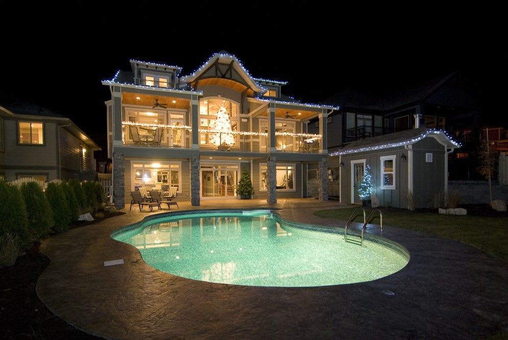 Lighting for your Kelowna pool construction is perfect for a night time dip.