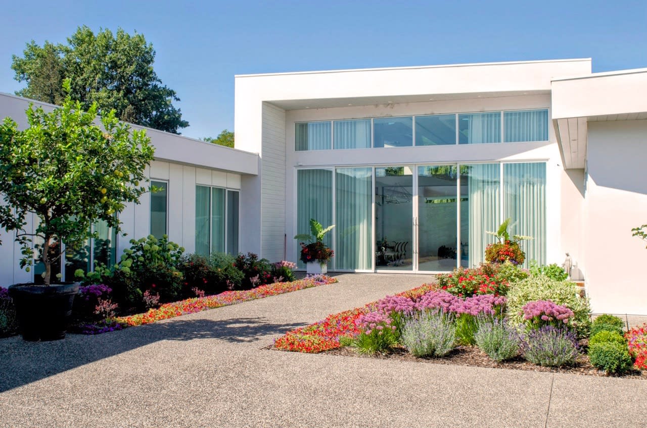 Low-maintenance xeriscaping is a sustainable way for outdoor plants to enhance the beauty of a space.